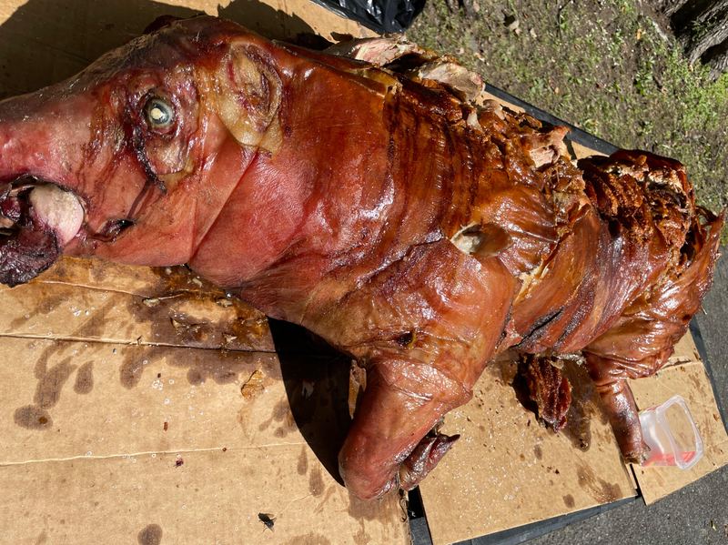 A whole pig roasted overnight.